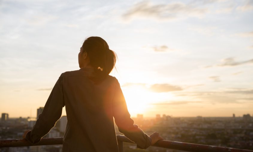 women see city view when sunset time