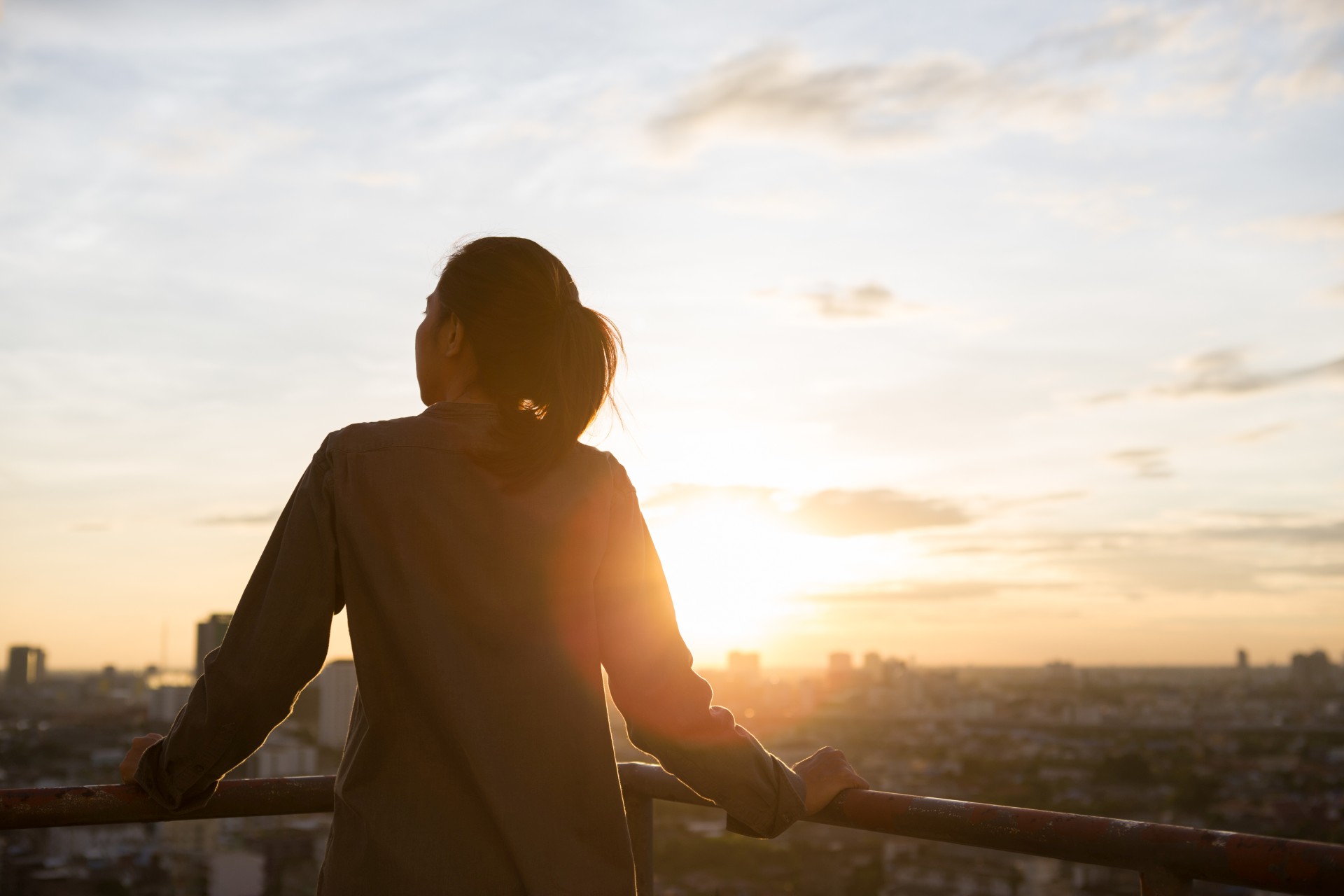 women see city view when sunset time